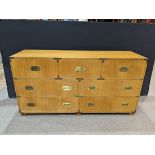 Baker campaign style chest, having a rectangular top, above sever drawers, 32"h x 62"w x 19"d