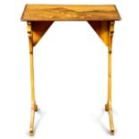 An Emile Galle marquetry decorated occasional table, the rectangular top displaying a naturalistic