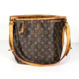 Louis Vuitton Noe shoulder bag, PM, executed in brown Monogram Coated Canvas, 24 x 26 x 18 cm