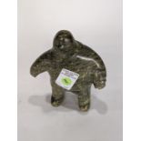 Inuit soapstone figural sculpture, 7.5"h
