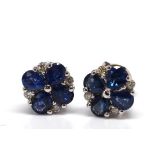Pair of sapphire, diamond, 14k yellow gold earrings Featuring (8) pear-cut sapphires, weighing a