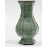 Chinese Guan-Type Lobed 'Hu' Vase ,Of pear-shape body with six lobed sides supported on a splayed