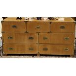 Baker campaign style tall chest, having a rectangular top, above sever drawers, 32"h x 62"w x 19"d