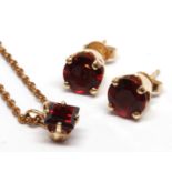 Garnet, yellow gold jewelry suite