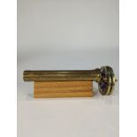 An American Modern brass and colored glass kaleidoscope