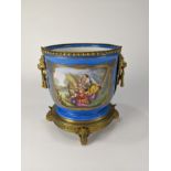 A French Sevres style gilt and blue wine cooler