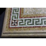 A custom mosaic top salon table in the Pompeiian taste