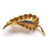 Sapphire, 18k yellow gold leaf brooch