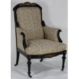 A Napoleon III ebonized and gilt bronze mounted bergere