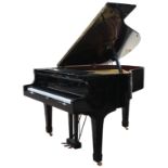 A Yamaha Model G1 baby grand piano