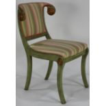 A custom made group of partial gilt and polychrome decorated salon chairs