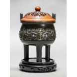 A Chinese Gilt Bronze Tripod Censer