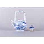 A Chinese blue and white handled teapot and cover