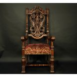 A Regency style carved walnut fauteuil