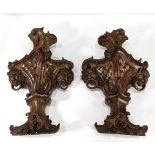 A pair of German Rococo carved walnut balustrade segments
