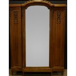 A French Louis XVI style triple door armoire