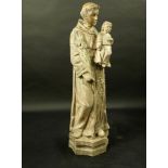 A continental wood carved santos figure depicting St. Francis circa 1880