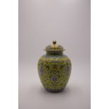 A Chinese Yellow Ground Famille-Rose Jar with cover, with "DaoGuang" Mark.