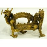 A Chinese Gilt-Copper Bronze Twin Dragon Stand