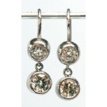 Pair of diamond, platinum, 14k white gold earrings