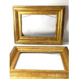 A pair of contemporary custom giltwood carved picture frames
