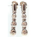 Pair of diamond, white gold earrings