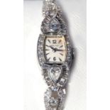 Lady's diamond, 14k white gold wristwatch