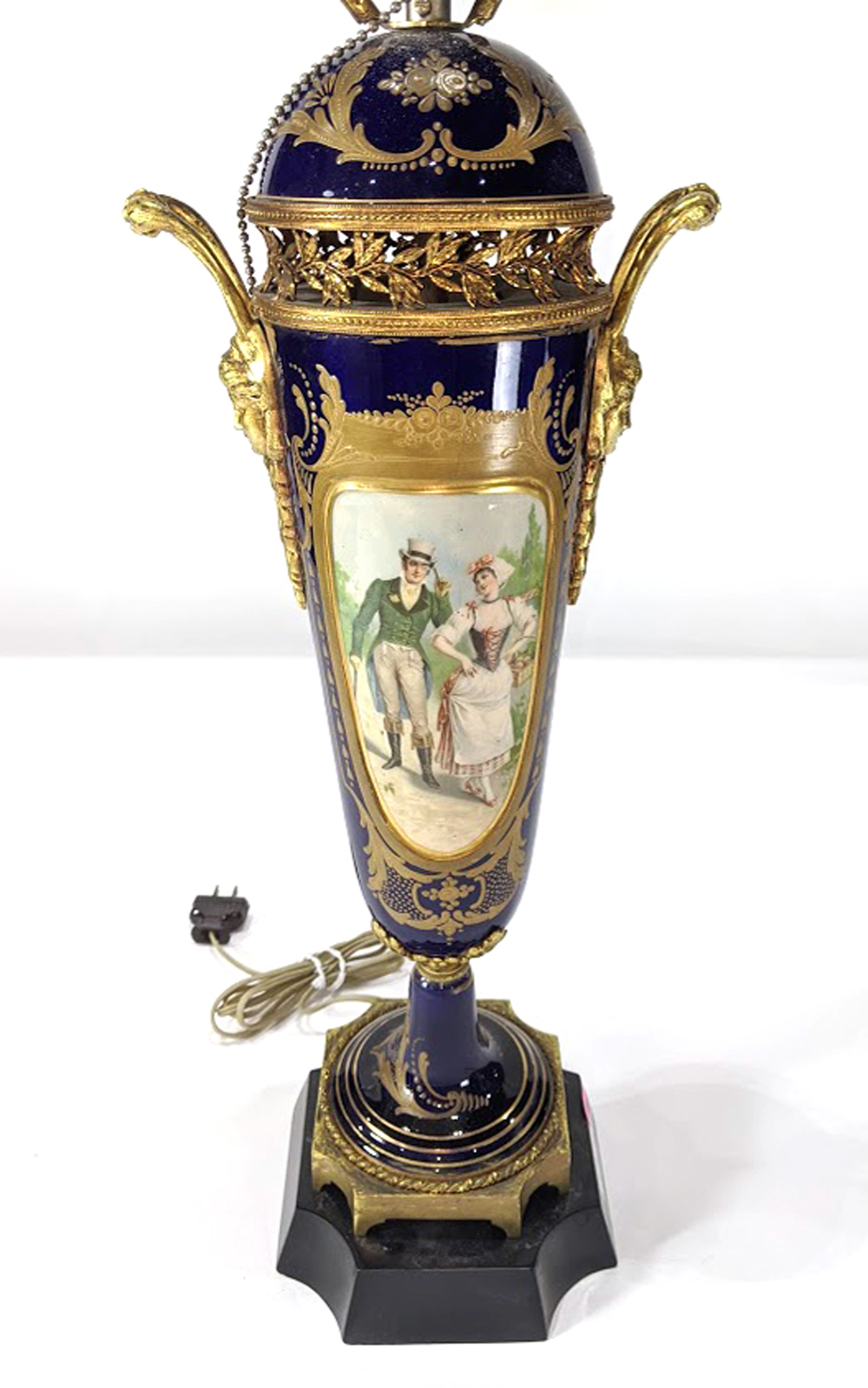 A Sevres style urn mounted as a lamp