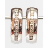 Pair of diamond, 18k white gold earrings