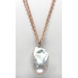 Baroque cultured pearl, 14k yellow gold pendant-necklace