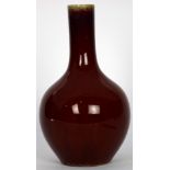 A Chinese copper red-glazed bottle vase