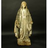 A carved wood Santos figure depicting Mary circa 1880