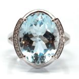 Blue topaz, diamond, 14k white gold ring