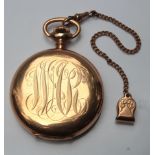 Elgin 14k yellow gold hunting case pocket watch with gold-filled chain