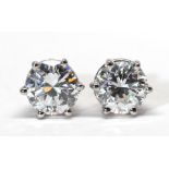 Pair of diamond, platinum earrings