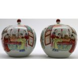 A pair of Chinese famille-rose lidded Jars