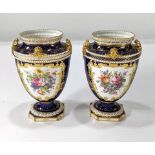 A pair of Royal Crown Derby urns