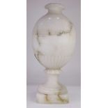 An Italian carved onyx covered urn, in the Classical taste