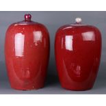 (lot of 2) A pair of Chinese ox-red glazed Lidded Ginger Jars