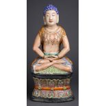 A Chinese famille-rose seated figure of shakyamuni