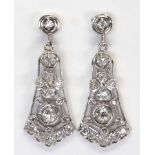 Pair of diamond, platinum, 14k white gold earrings