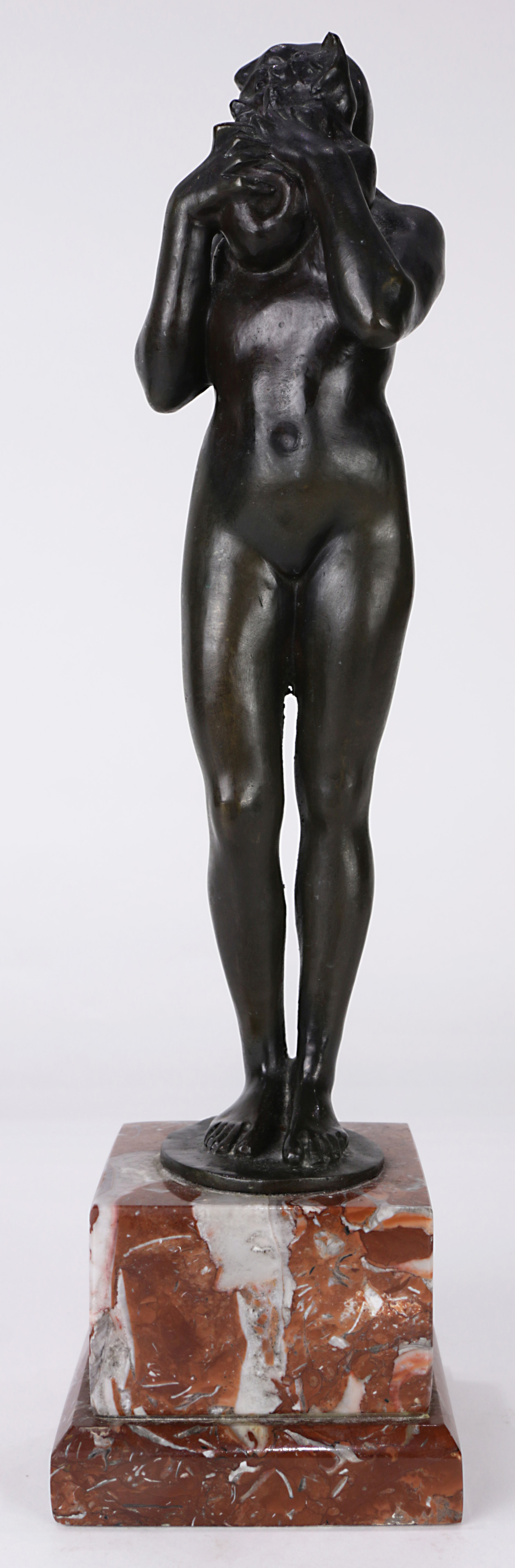 A French Art Nouveau style patinated bronze sculpture