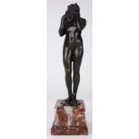 A French Art Nouveau style patinated bronze sculpture