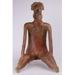 A Pre-Columbian Nayarit, West Mexico, seate male figure Ex Ron Messick