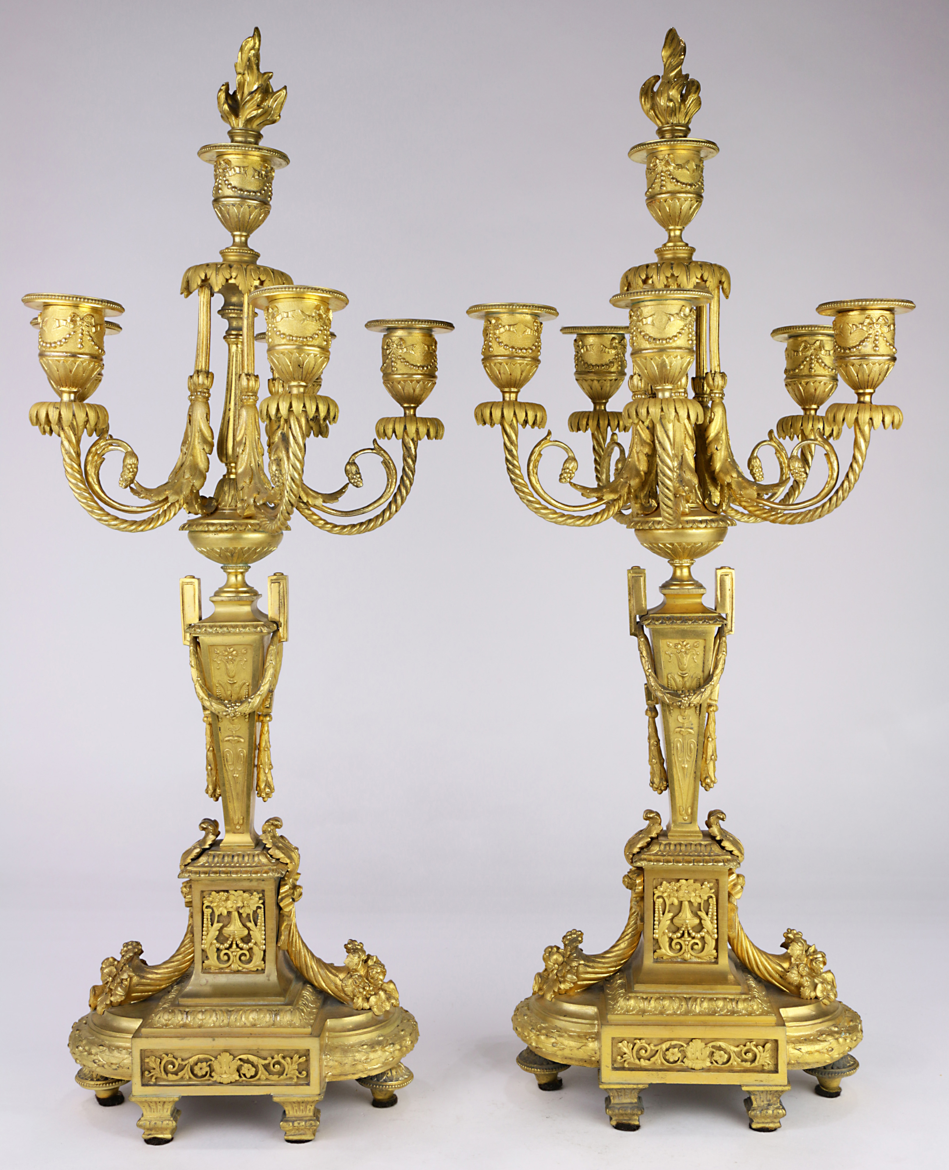 A Pair of Neoclassical style gilt candelabra