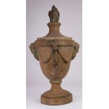 A terra cotta urn in the Classical taste