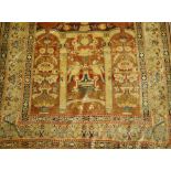 An antique silk Persian carpet