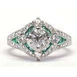 Diamond, emerald, platinum ring