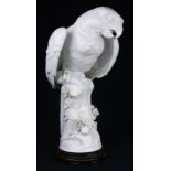 A large Continental blanc de chine porcelain figure of a parrot