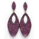 Pair of ruby, blackened silver, 14k yellow gold earrings